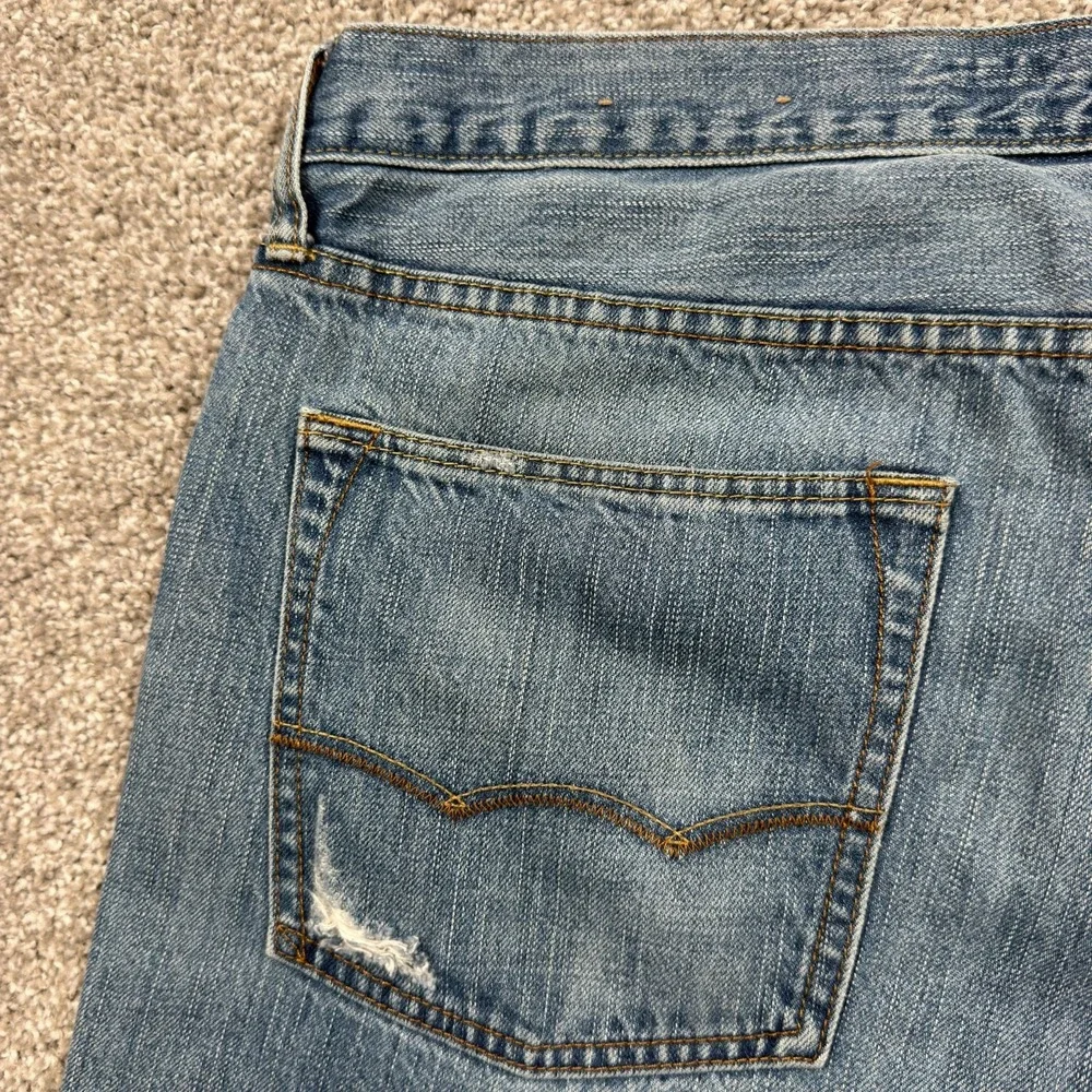 American Eagle Original Boot Jeans Mens 36x32 Blue Distressed Faded Bootcut